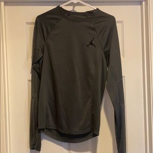 Long sleeve grey Jordan shirt.